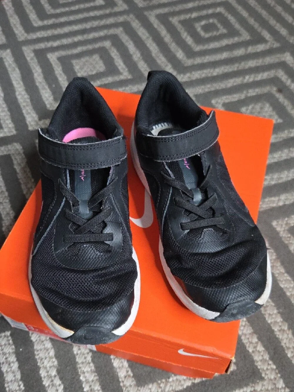 Nike Kids Black Sneakers with Pink Swoosh